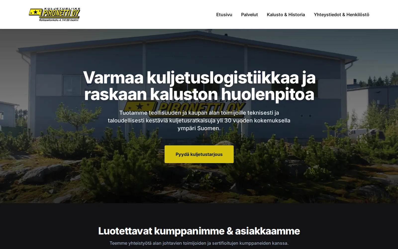 Pironetti Oy:n etusivu: yrityksen halli ja otsikko Varmaa kuljetuslogistiikkaa ja raskaan kaluston huolenpitoa.